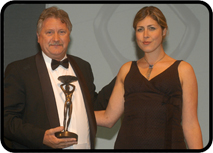 Rachel presenting Brian Turner with the Special Award at The Cateys 2004